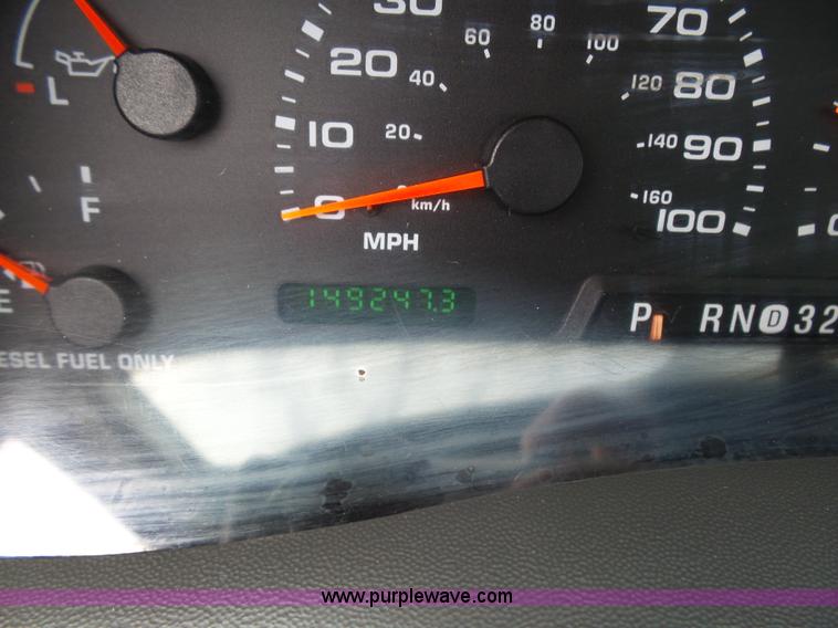 image for item K1332 2004 Ford F350 Super Duty dump flatbed pickup truck