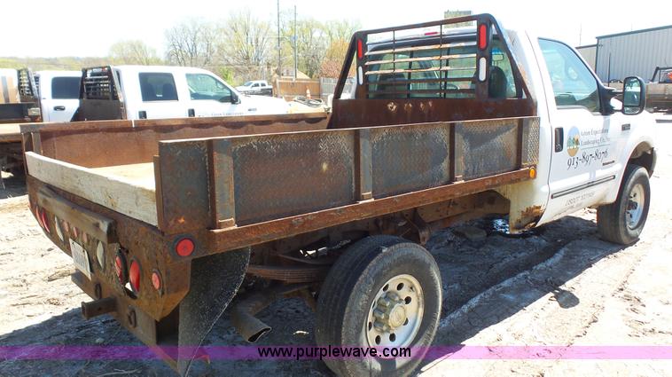 image for item K4506 2000 Ford F250 Super Duty flatbed pickup truck