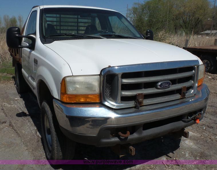 image for item K4506 2000 Ford F250 Super Duty flatbed pickup truck