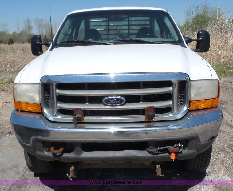 image for item K4506 2000 Ford F250 Super Duty flatbed pickup truck