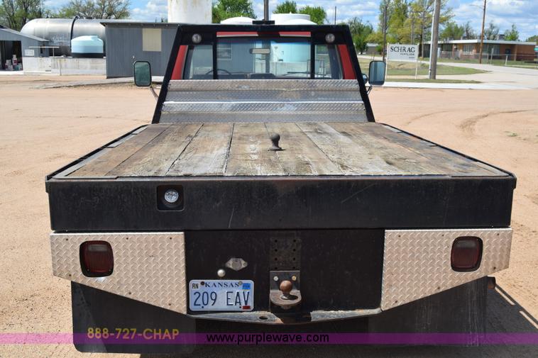 image for item K6746 1985 Ford F350 flatbed pickup truck