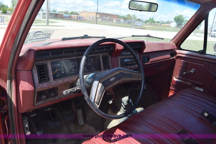 image for item K6746 1985 Ford F350 flatbed pickup truck