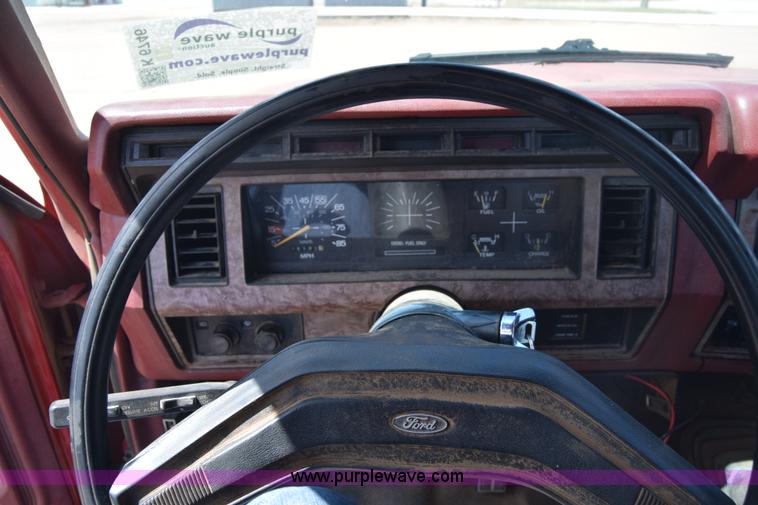 image for item K6746 1985 Ford F350 flatbed pickup truck