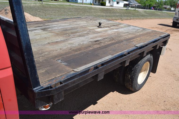 image for item K6746 1985 Ford F350 flatbed pickup truck