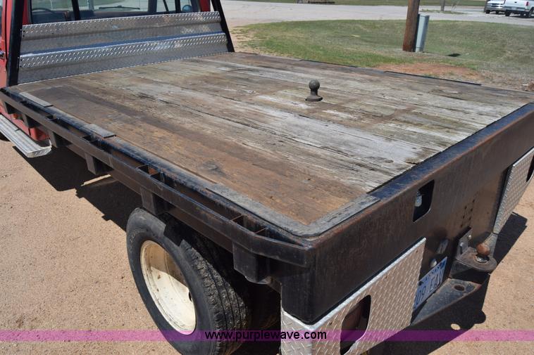 image for item K6746 1985 Ford F350 flatbed pickup truck