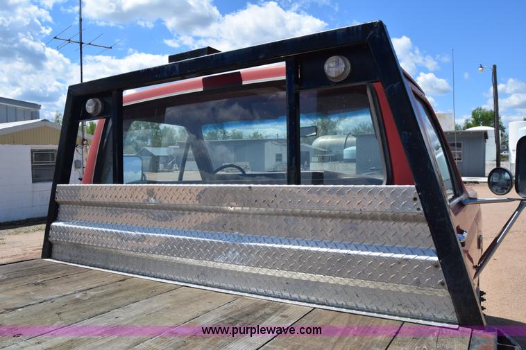 image for item K6746 1985 Ford F350 flatbed pickup truck