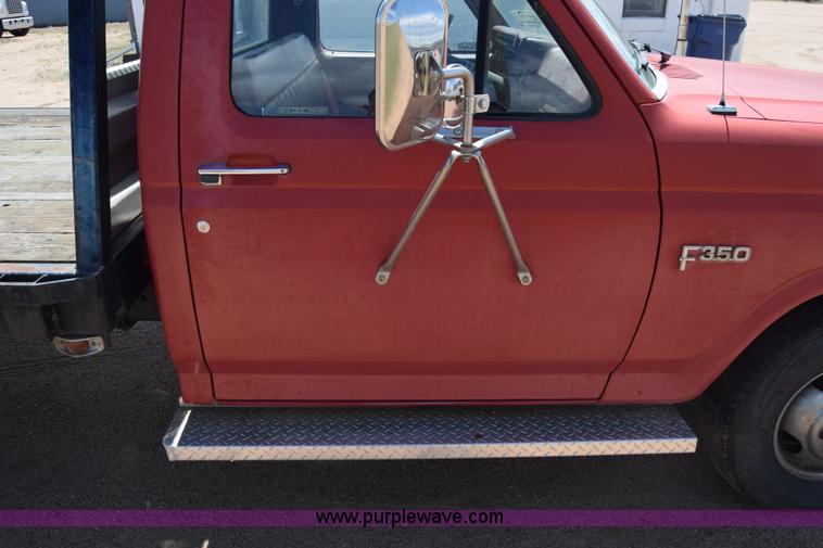 image for item K6746 1985 Ford F350 flatbed pickup truck