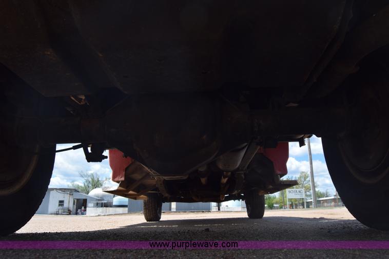 image for item K6746 1985 Ford F350 flatbed pickup truck