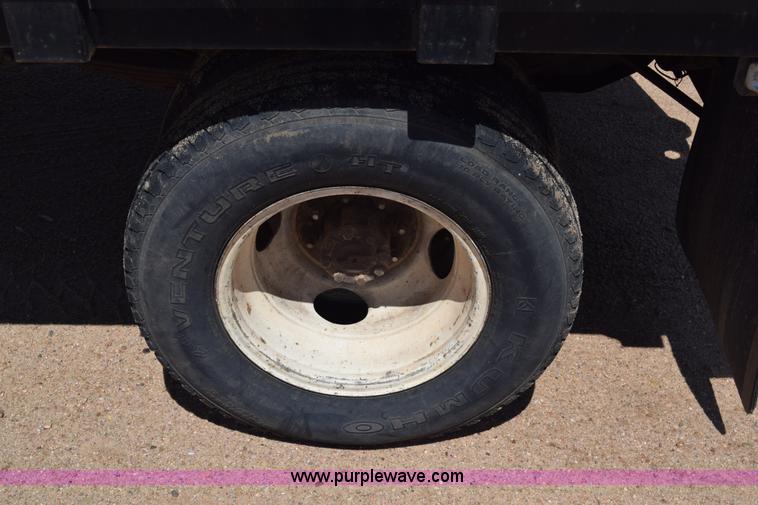 image for item K6746 1985 Ford F350 flatbed pickup truck