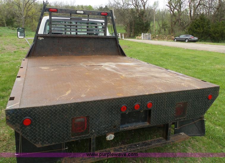 image for item K7966 1995 Ford F350 flatbed pickup truck