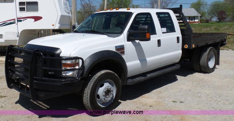 image for item K7997 2010 Ford F450 Super Duty flatbed pickup truck