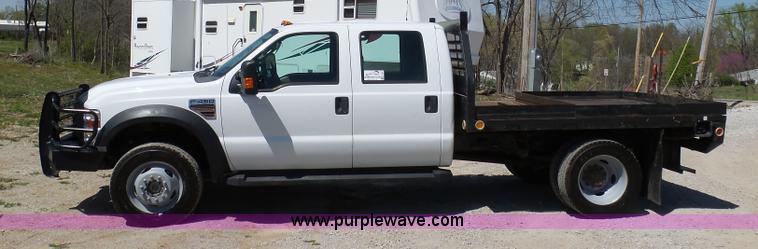 image for item K7997 2010 Ford F450 Super Duty flatbed pickup truck