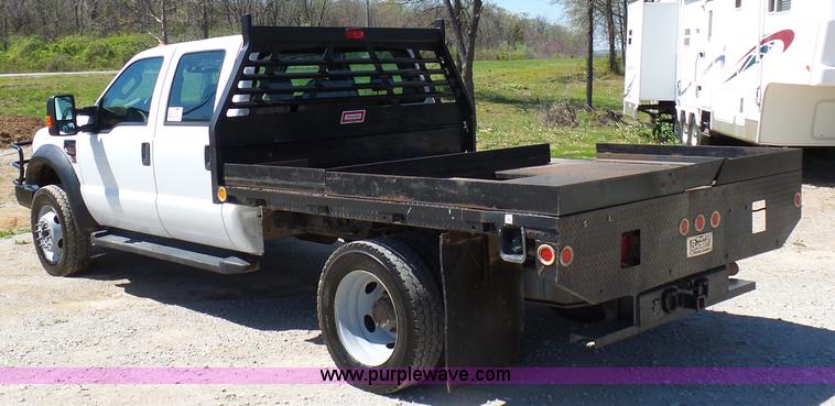 image for item K7997 2010 Ford F450 Super Duty flatbed pickup truck