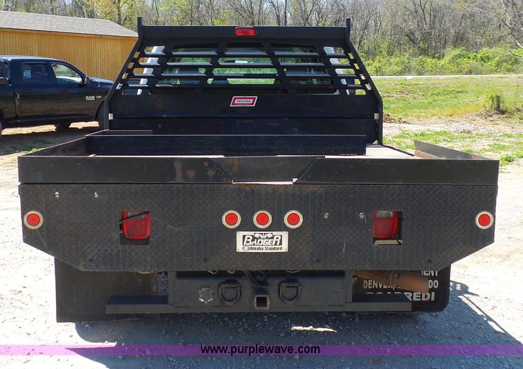 image for item K7997 2010 Ford F450 Super Duty flatbed pickup truck