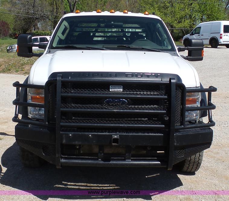 image for item K7997 2010 Ford F450 Super Duty flatbed pickup truck