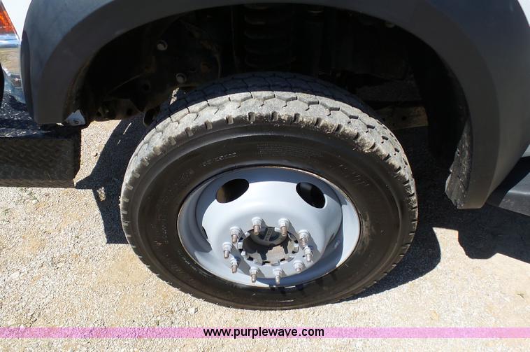 image for item K7997 2010 Ford F450 Super Duty flatbed pickup truck