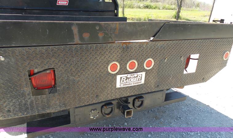 image for item K7997 2010 Ford F450 Super Duty flatbed pickup truck