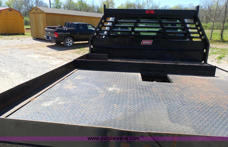 image for item K7997 2010 Ford F450 Super Duty flatbed pickup truck