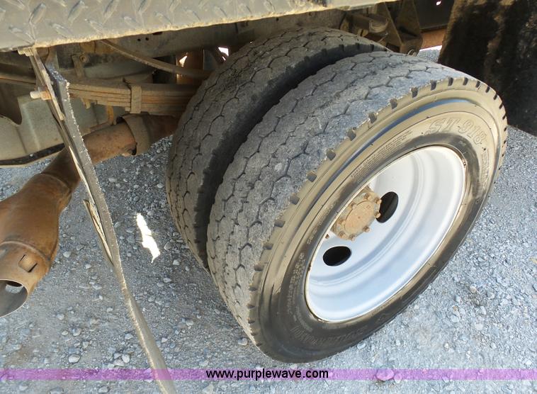 image for item K7997 2010 Ford F450 Super Duty flatbed pickup truck