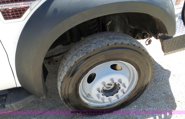 image for item K7997 2010 Ford F450 Super Duty flatbed pickup truck