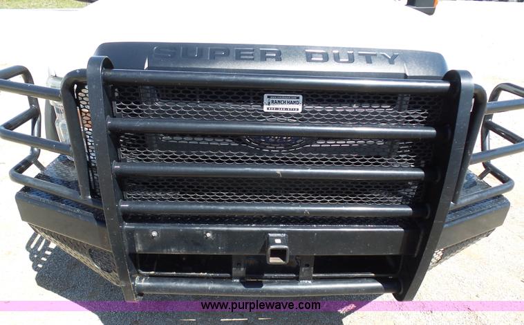 image for item K7997 2010 Ford F450 Super Duty flatbed pickup truck