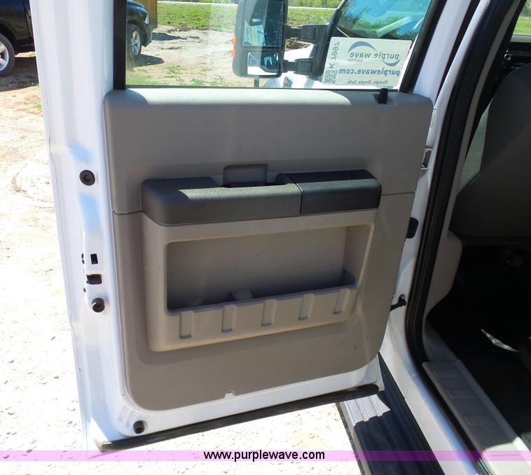 image for item K7997 2010 Ford F450 Super Duty flatbed pickup truck