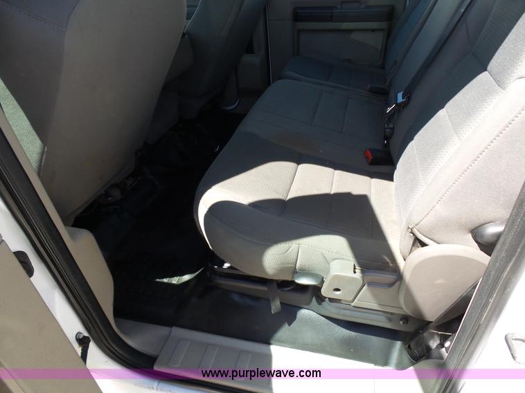 image for item K7997 2010 Ford F450 Super Duty flatbed pickup truck