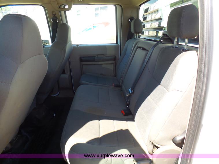 image for item K7997 2010 Ford F450 Super Duty flatbed pickup truck