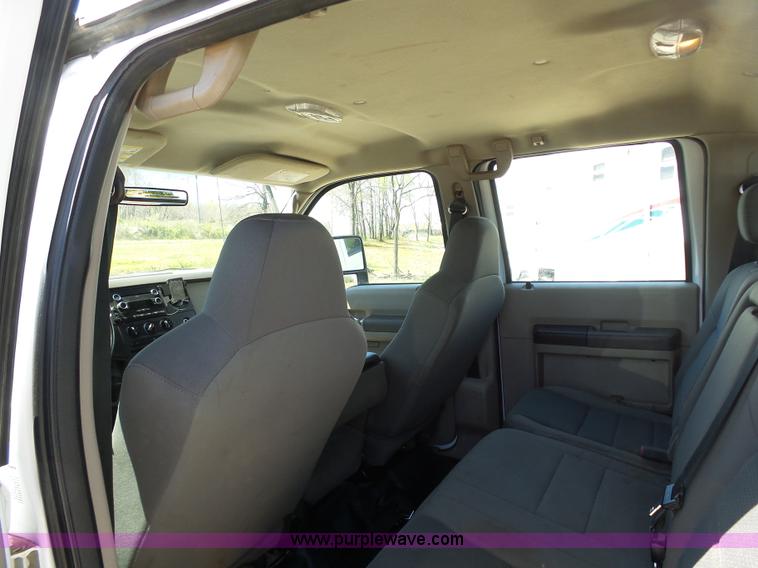 image for item K7997 2010 Ford F450 Super Duty flatbed pickup truck