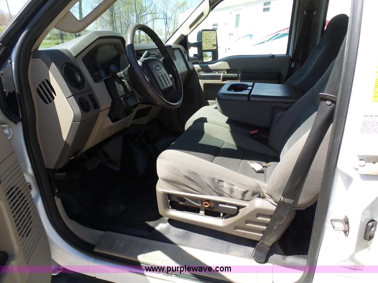 image for item K7997 2010 Ford F450 Super Duty flatbed pickup truck