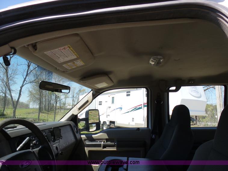 image for item K7997 2010 Ford F450 Super Duty flatbed pickup truck