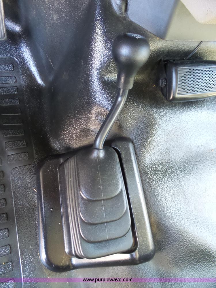 image for item K7997 2010 Ford F450 Super Duty flatbed pickup truck