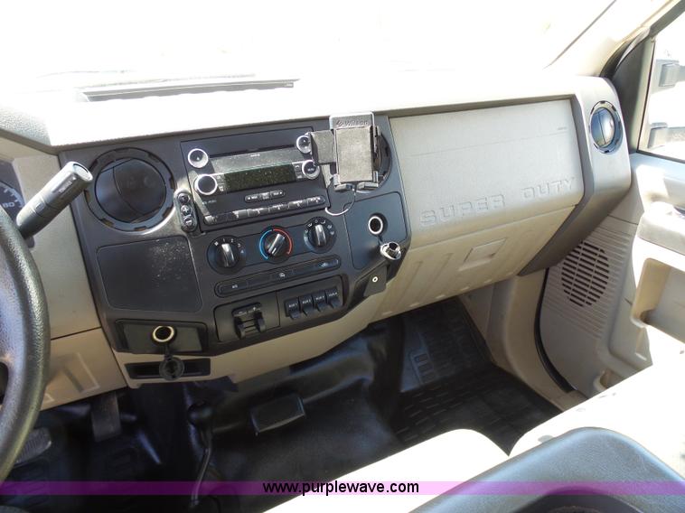 image for item K7997 2010 Ford F450 Super Duty flatbed pickup truck