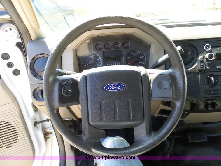 image for item K7997 2010 Ford F450 Super Duty flatbed pickup truck