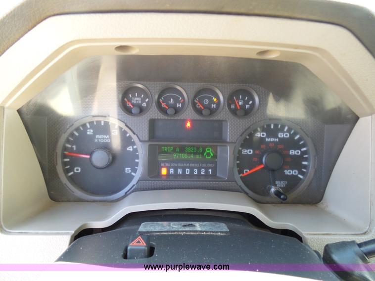 image for item K7997 2010 Ford F450 Super Duty flatbed pickup truck