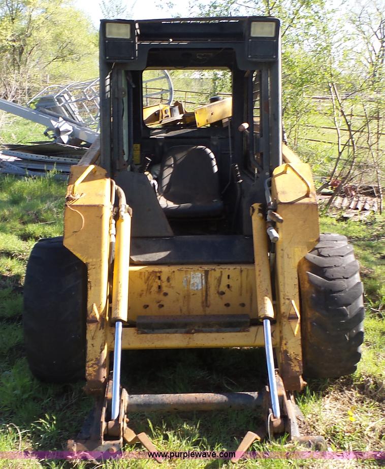 image for item K8276 John Deere 7775 skid steer