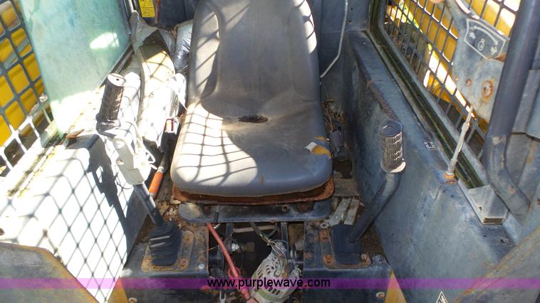 image for item K8276 John Deere 7775 skid steer