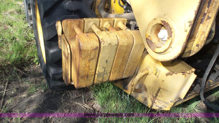 image for item K8276 John Deere 7775 skid steer