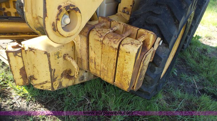 image for item K8276 John Deere 7775 skid steer