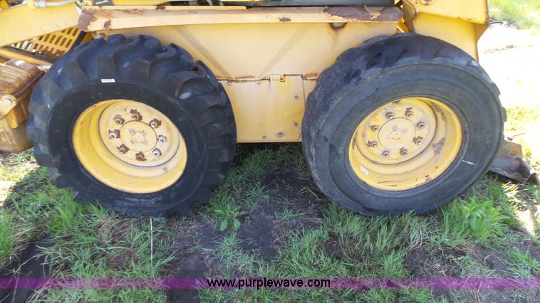 image for item K8276 John Deere 7775 skid steer