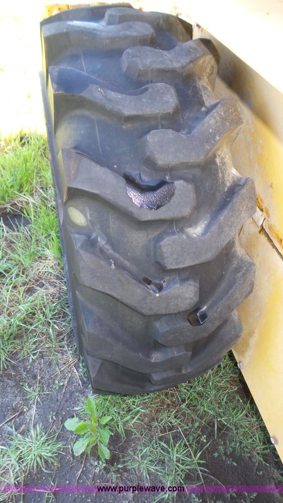 image for item K8276 John Deere 7775 skid steer