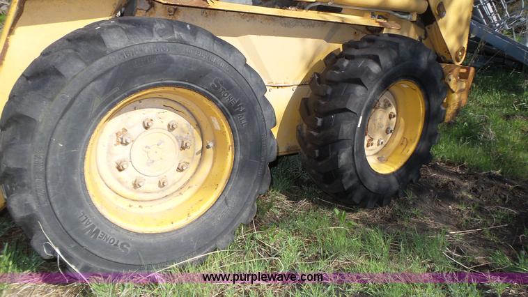 image for item K8276 John Deere 7775 skid steer