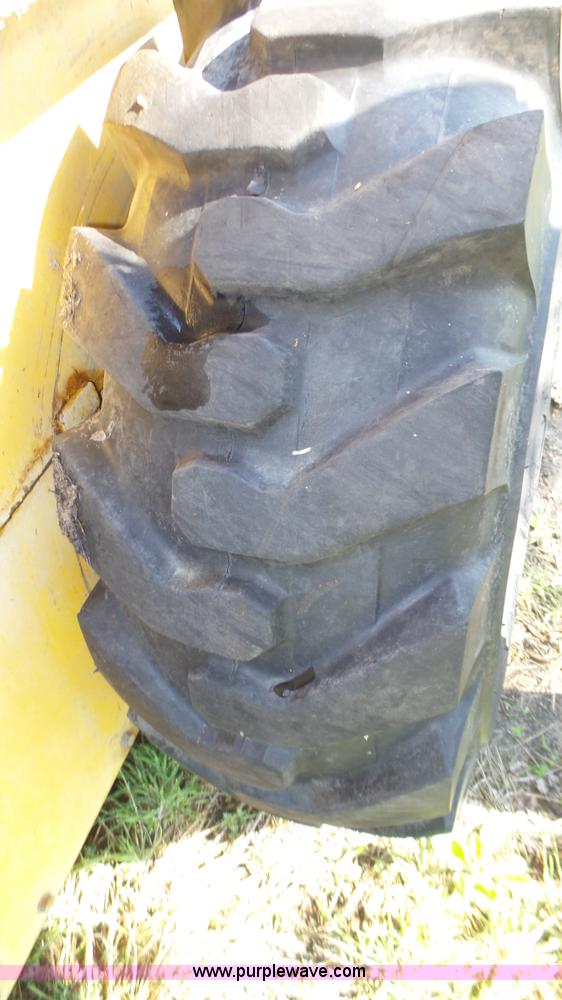 image for item K8276 John Deere 7775 skid steer