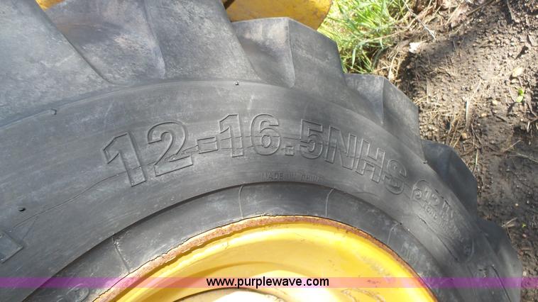 image for item K8276 John Deere 7775 skid steer