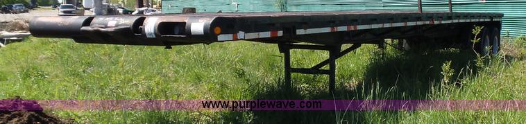 image for item L5810 2002 AMC flatbed trailer