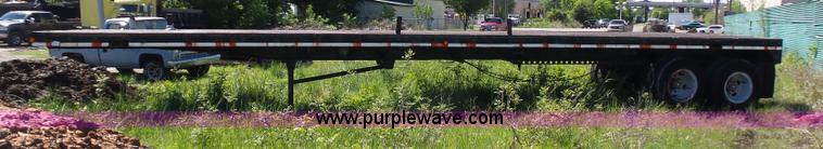 image for item L5810 2002 AMC flatbed trailer