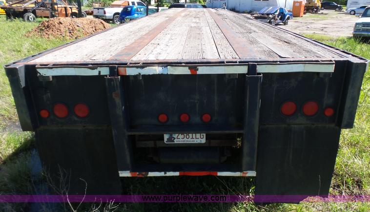 image for item L5810 2002 AMC flatbed trailer