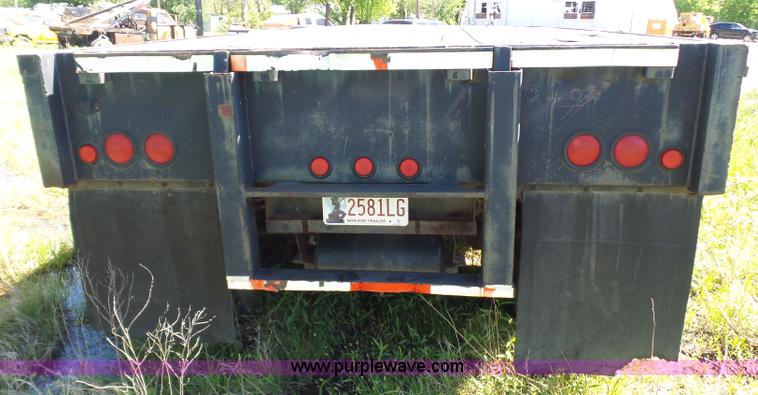 image for item L5810 2002 AMC flatbed trailer