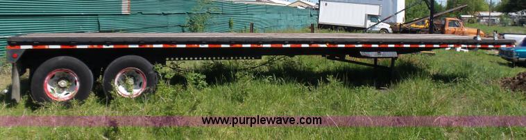 image for item L5810 2002 AMC flatbed trailer