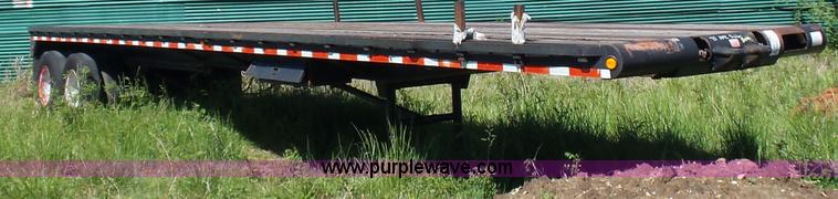 image for item L5810 2002 AMC flatbed trailer